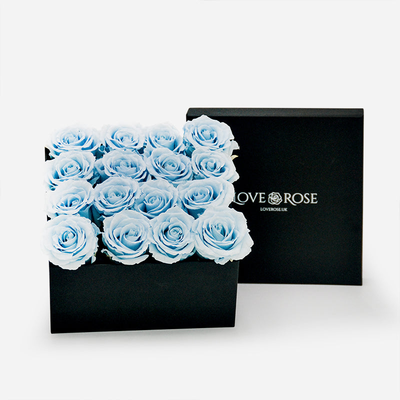 A large black luxury box with 16 blue infinity roses