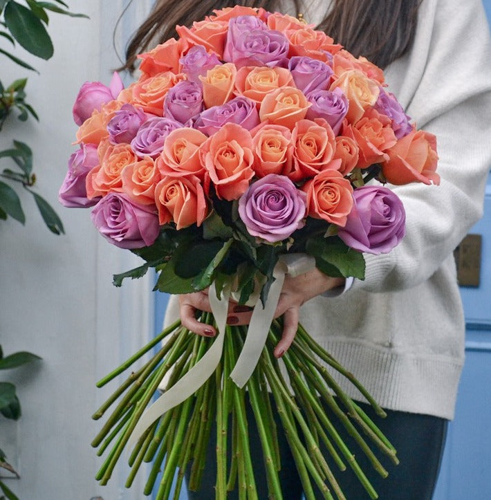 orange and purple rose bouquet