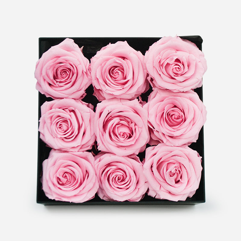 9 pink forever roses, arranged in a luxury black box