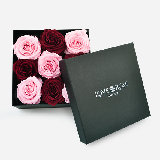 A box with 9 luxury forever roses in pink and red