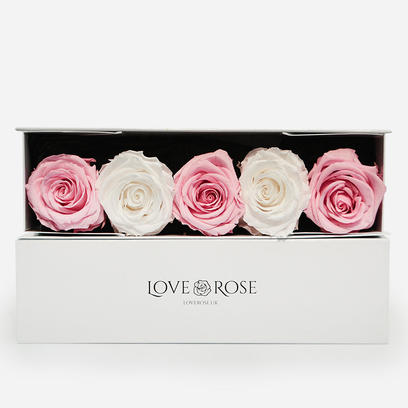 Luxury white box with 5 forever roses in pink and white