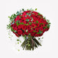 Red Roses with Ivy arranged in a stunning luxury bouquet