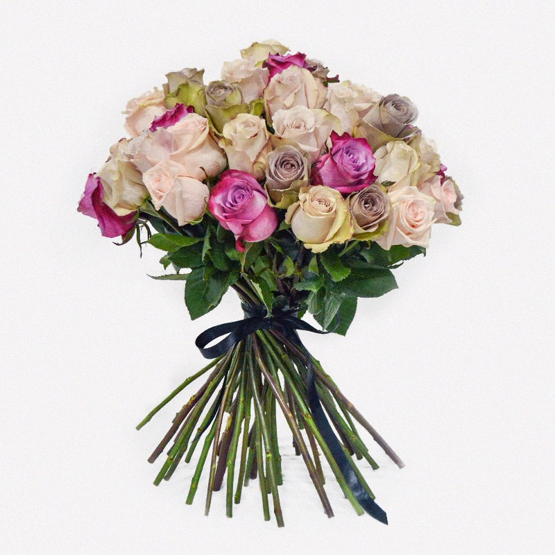 luxury avalanche rose bouquet hand-tied with peach, purple and chocolate roses